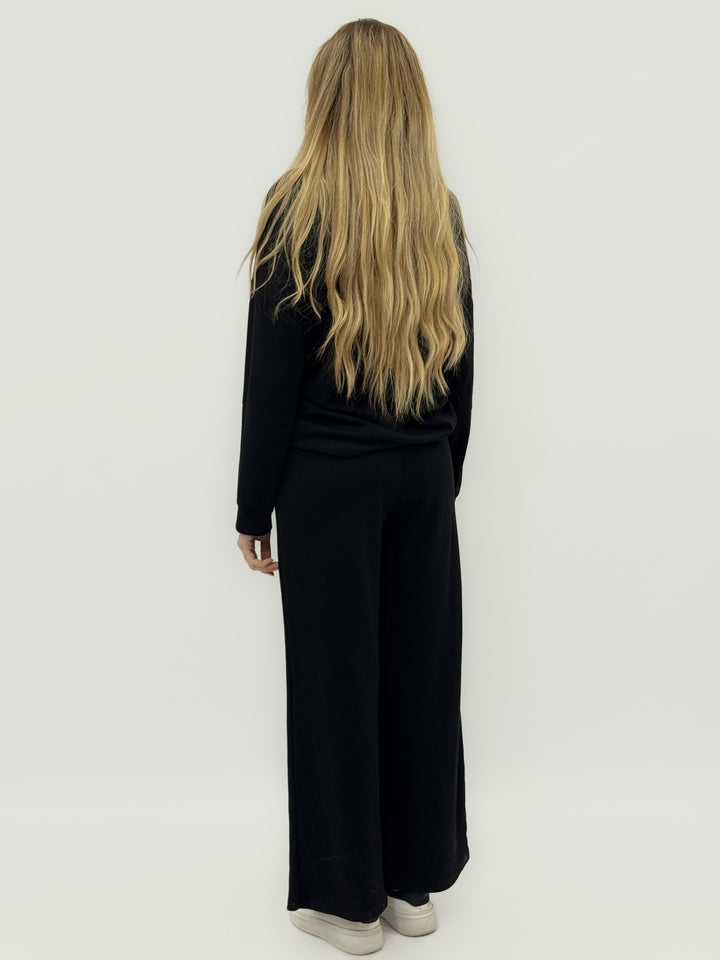 Emma & Rose Cape Town Una™ complete minimal hoodie trousers in black, featuring a relaxed fit and casual style.
