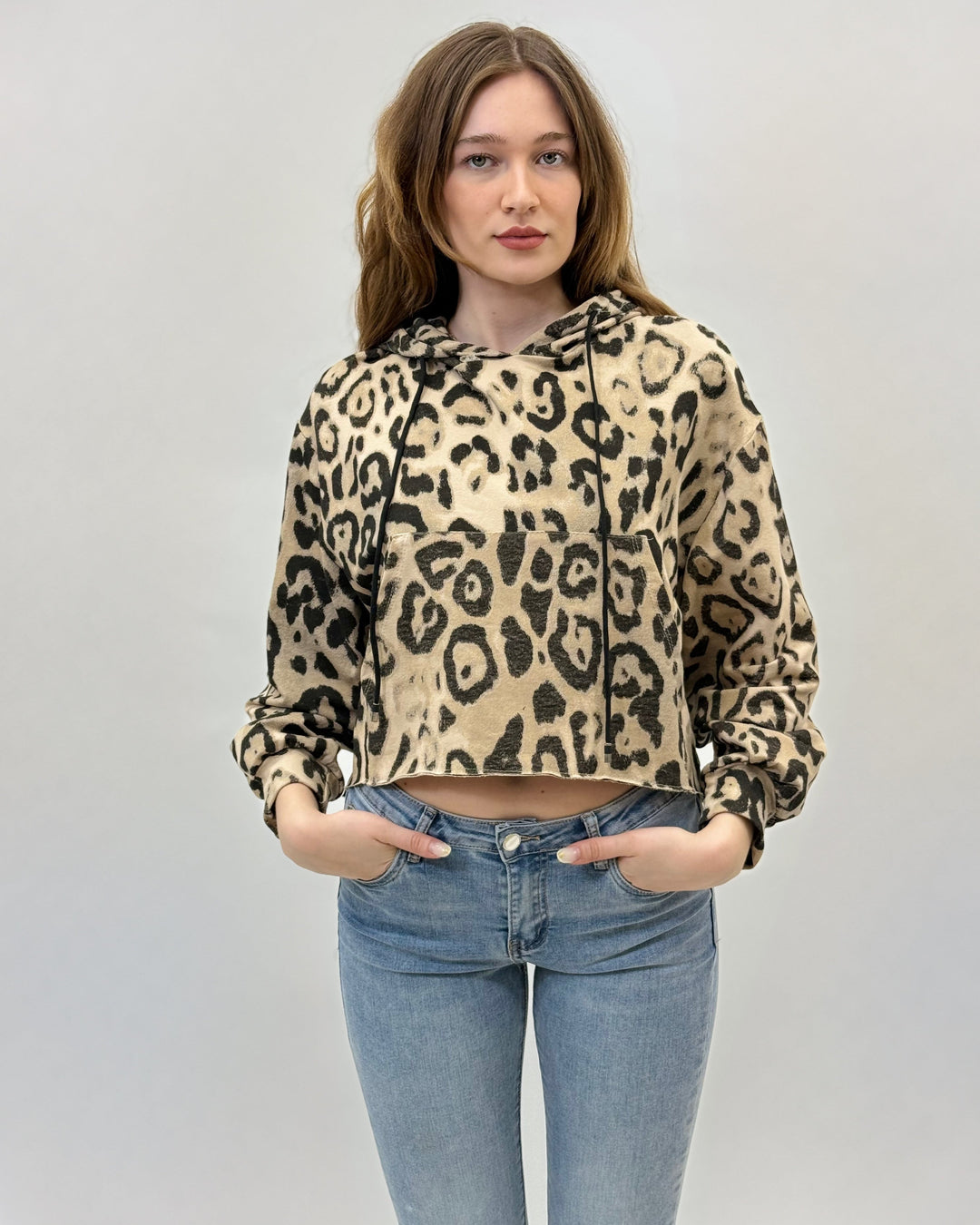 Jacoba™ animal print hoodie by Emma & Rose Cape Town, cozy hoodie with bold animal pattern and relaxed fit.