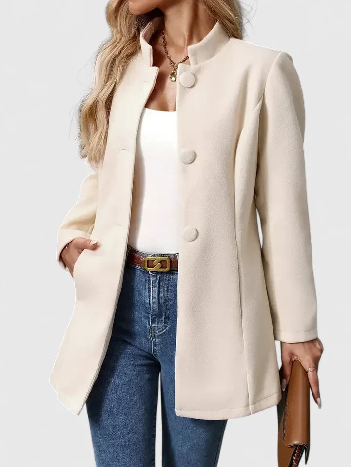 Cream Carmelyssa™ elegant jacket by Emma & Rose Cape Town, showcasing tailored design and stylish fabric details.
