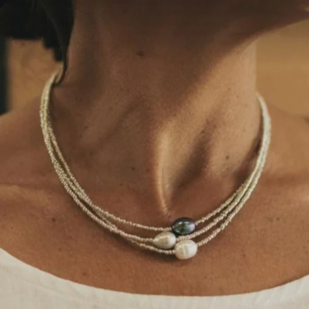 Annelie™ pearl necklace by Emma & Rose Cape Town featuring elegant white pearls on a delicate chain.