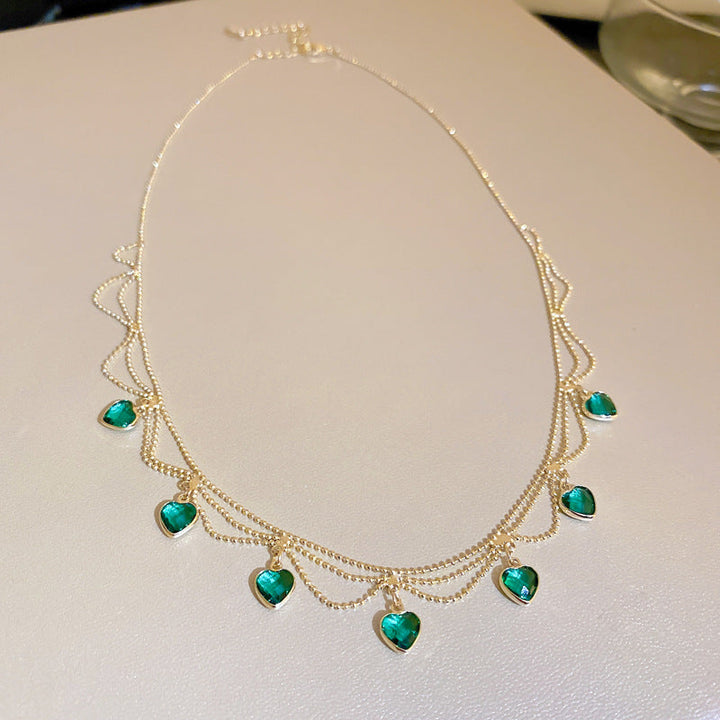 Heart™ Radiant Necklace by Emma & Rose Cape Town featuring a sparkling heart-shaped pendant on a delicate chain.