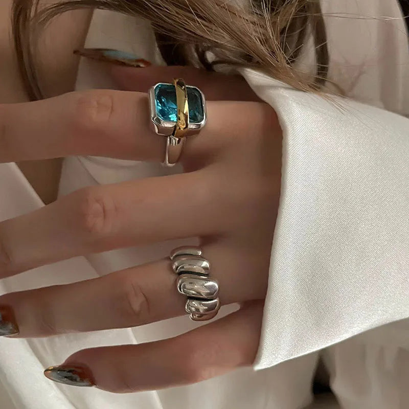 Kirsten™ Blue Zircon Silver Ring by Emma & Rose Cape Town featuring a sparkling blue zircon gemstone and a sleek silver band.