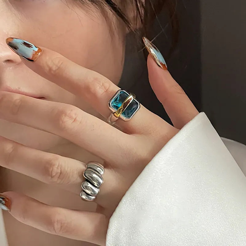 Emma & Rose Cape Town Kirsten blue zircon silver ring featuring a detailed band and sparkling blue zircon gemstone.