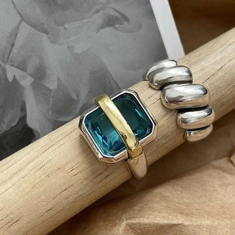 Kirsten™ Blue Zircon Silver Ring by Emma & Rose Cape Town featuring a sparkling blue zircon gemstone on a sleek silver band.