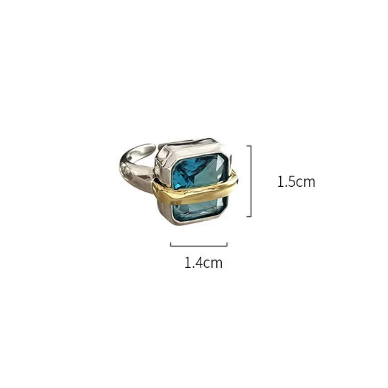 Silver ring featuring a blue zircon stone from the Kirsten™ collection by Emma & Rose Cape Town, showcasing a detailed jewelry design.