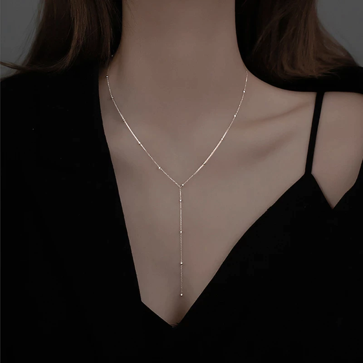 Lieke™ collarbone necklace with tassels from Emma & Rose Cape Town, featuring delicate chain and hanging tassel accents.