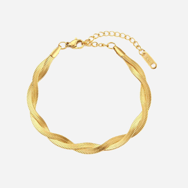 Emma & Rose Cape Town Madiorelle™ twisted 18k gold armband featuring elegant, handcrafted jewelry design with polished finish.