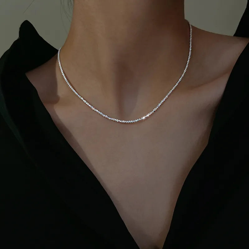Rozanne™ Emma & Rose Cape Town elegance clavicle necklace with delicate chain and subtle pendant, stylish and feminine jewelry piece.