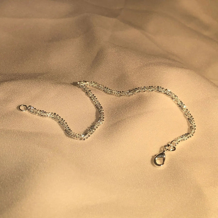 Emma & Rose Cape Town Shining™ Refined Bracelet with intricate silver design and elegant clasp on a white background