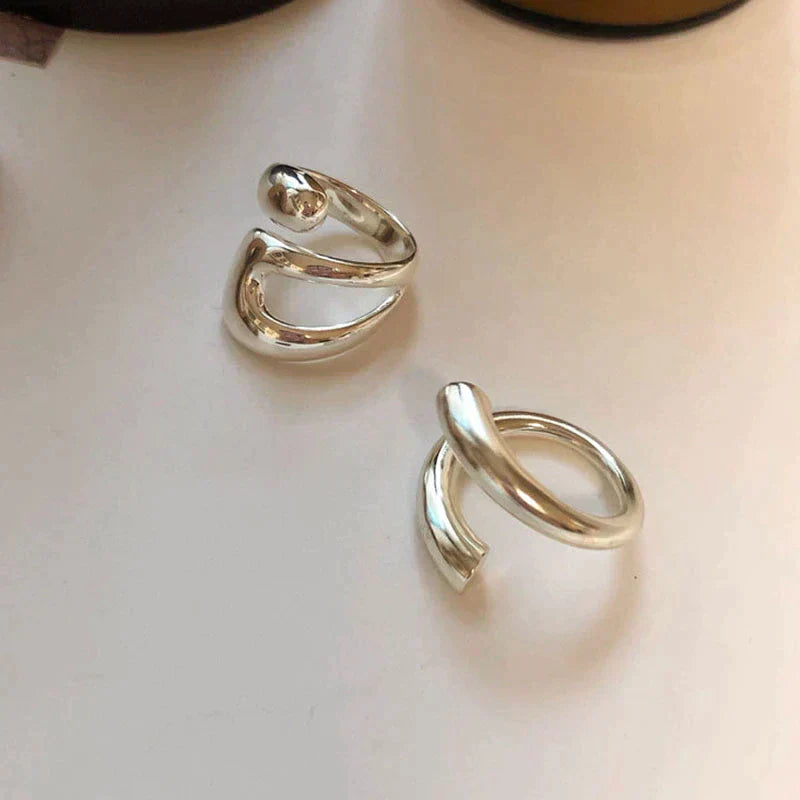 Emma & Rose Cape Town Vanessa™ elegant adjustable ring with intricate design, featuring a polished silver finish and delicate band.
