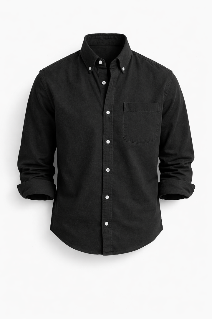 Black Keldros™ casual-chic shirt by Emma & Rose Cape Town, featuring a stylish, relaxed fit with button details.