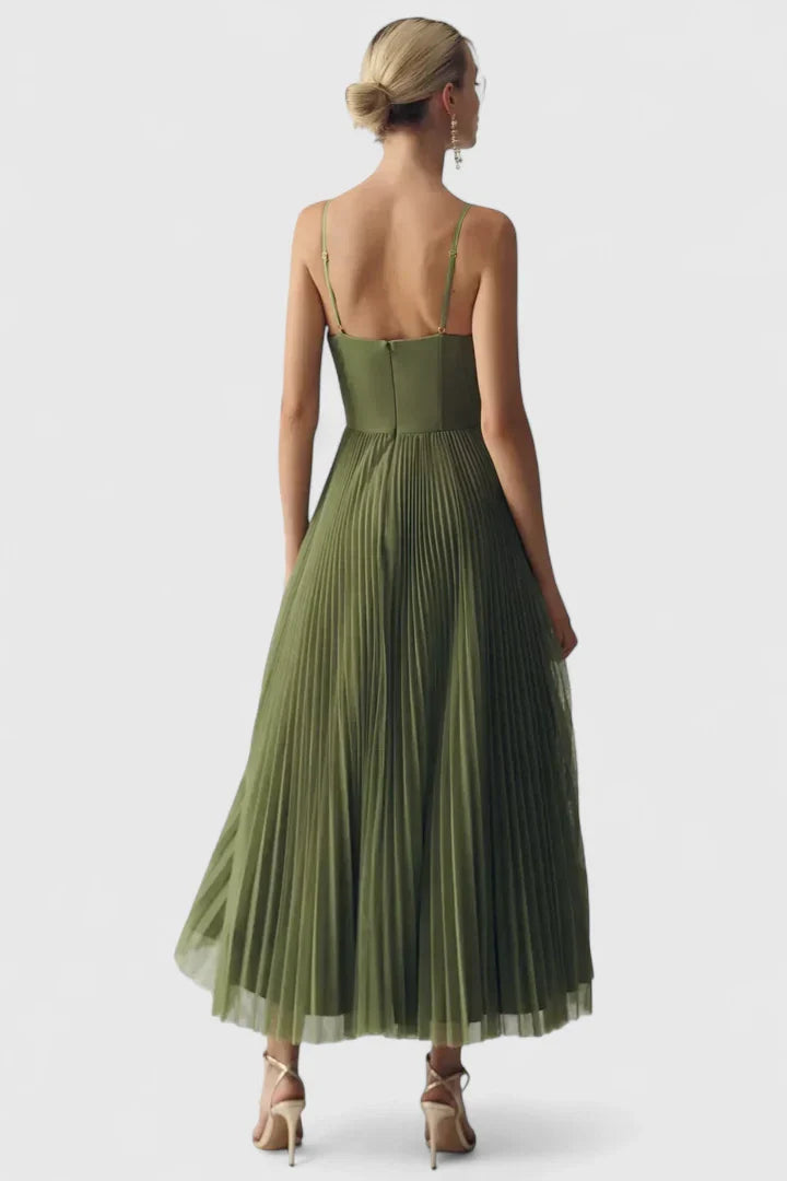 Green Hylyana™ elegant dress by Emma & Rose Cape Town, featuring a stylish design and flowing fabric, perfect for formal occasions.