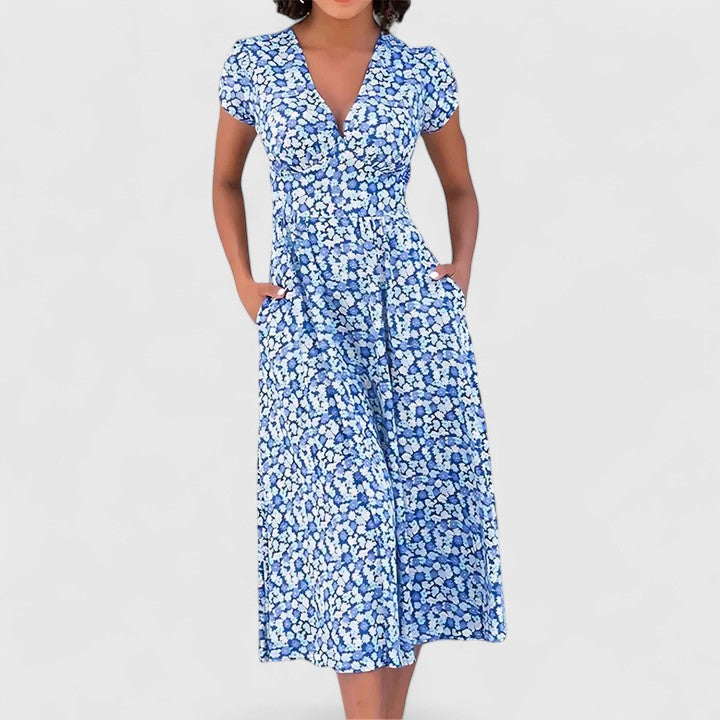 Emma & Rose Cape Town Roseanna™ blue midi dress, comfortable flowy dress with short sleeves and elegant design.