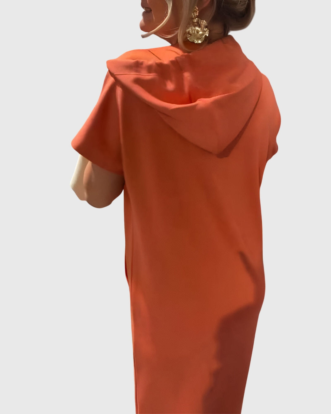 Orange Marlowe casual hoodie dress by Emma & Rose Cape Town, displaying a relaxed fit and soft fabric.