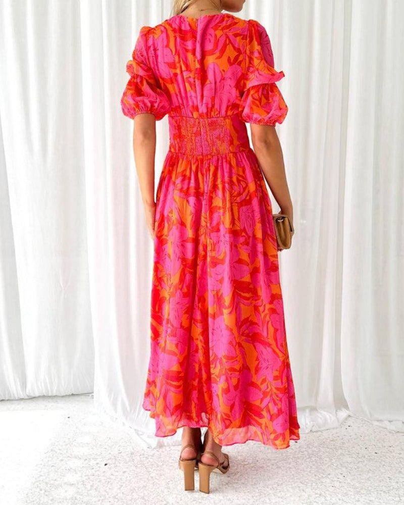 Pink VIVIENNE Paloma maxi dress with puff sleeves by Emma & Rose Cape Town, shown on a mannequin.