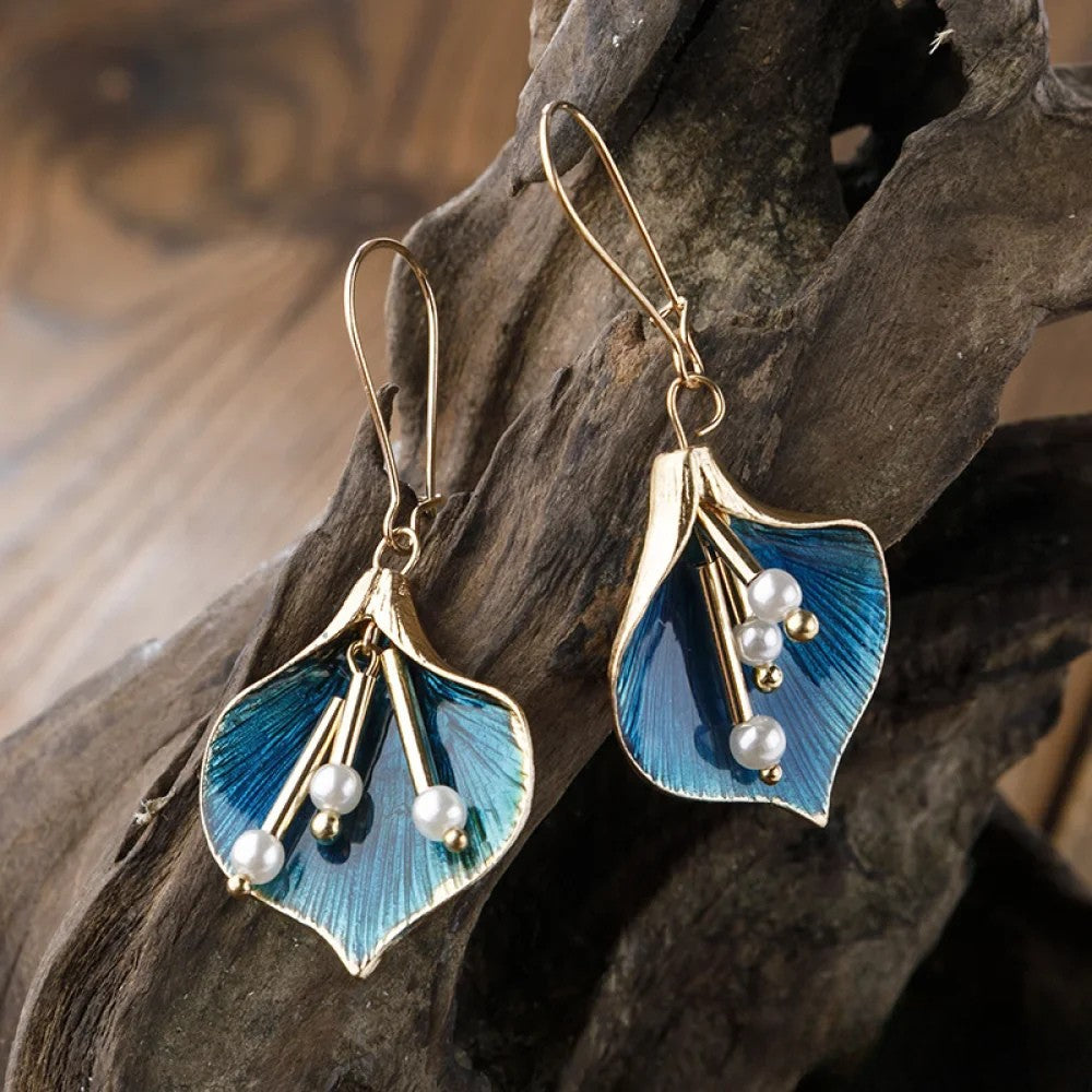 Antique blue lotus earrings from Emma & Rose Cape Town, featuring intricate floral design in a stylish earrings pair.