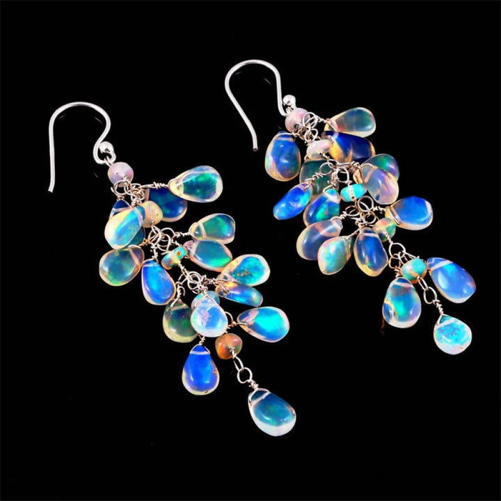 Emma & Rose Cape Town Moonstone delicate earrings with sparkling moonstone gemstones and fine metal hooks.