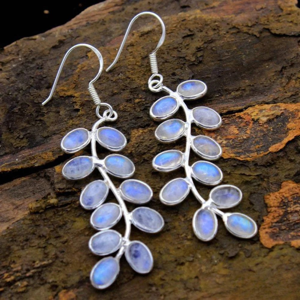 Emma & Rose Cape Town Moonstone delicate earrings featuring small moonstone gemstones and intricate metalwork.