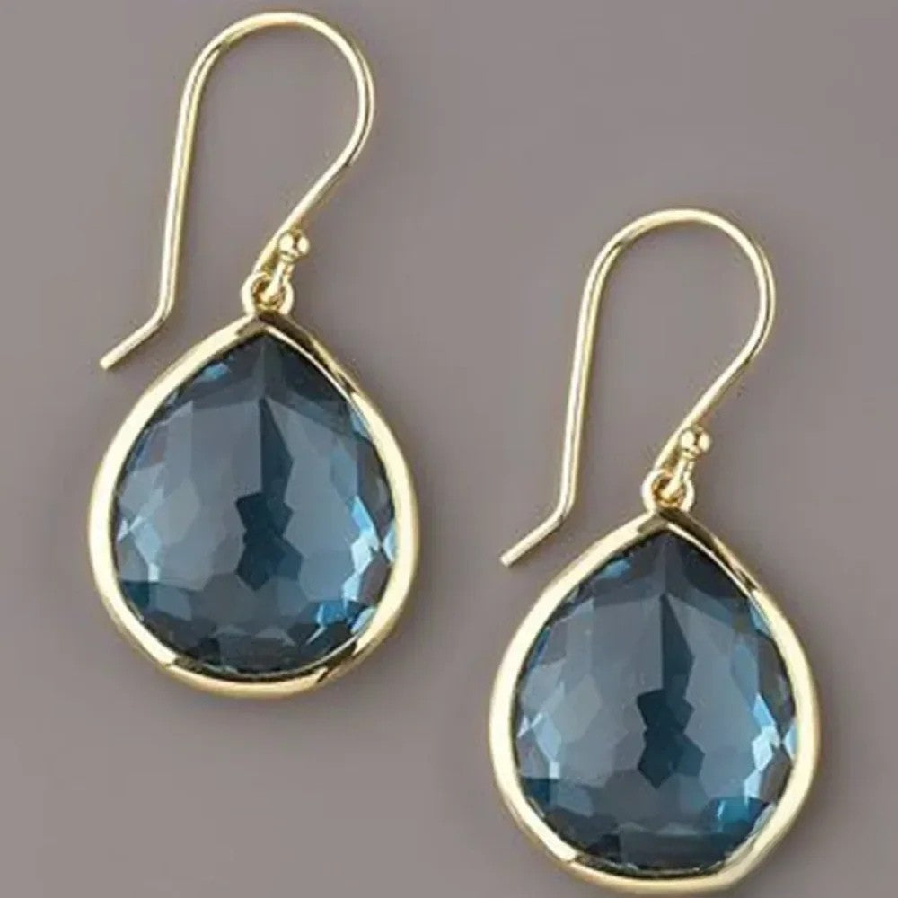Blue Drop Earrings by Emma & Rose Cape Town, Retro™ collection, featuring elegant teardrop-shaped earrings with a vibrant blue finish.
