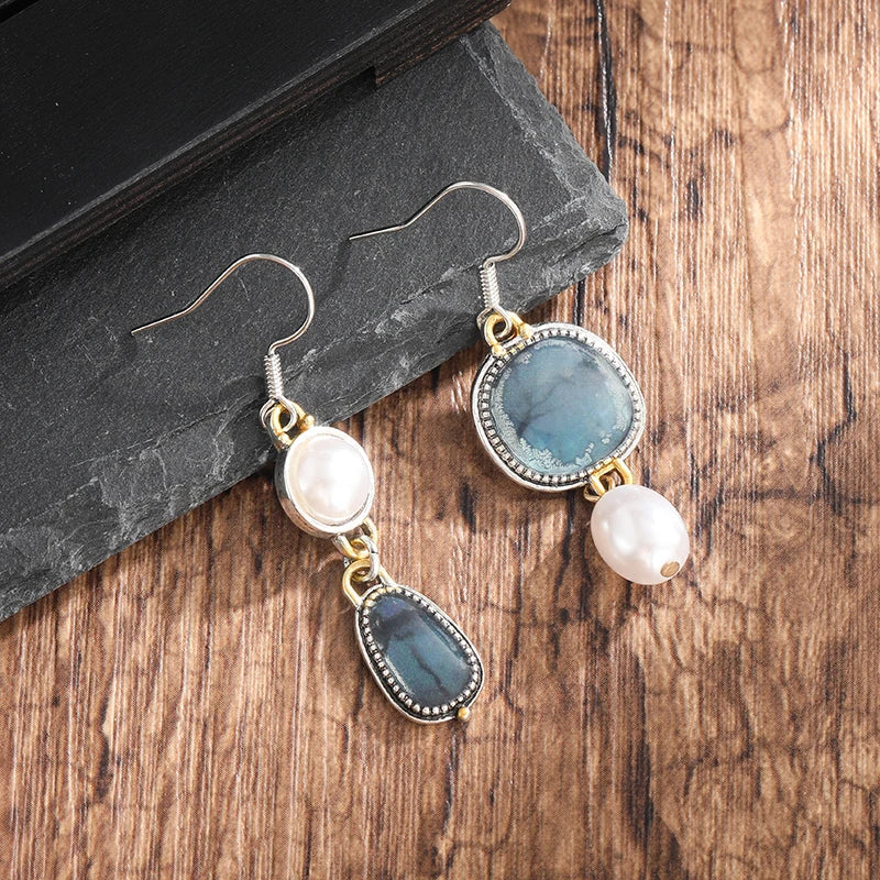 Retro Blue Natural Stone Earrings by Emma & Rose Cape Town featuring handcrafted blue stone dangle earrings.