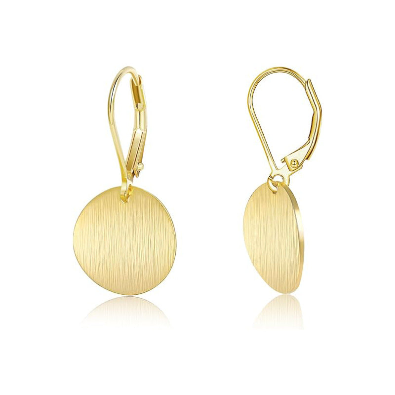 Retro™ Golden Disc Earrings by Emma & Rose Cape Town featuring shiny, circular gold-tone earrings with a vintage-inspired design.
