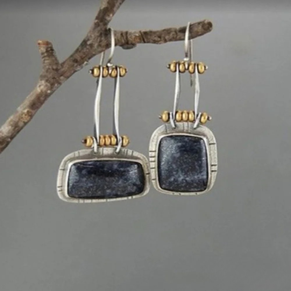 Retro™ Midnight Silver Earrings by Emma & Rose Cape Town featuring sleek, polished silver earrings with a vintage-inspired design.