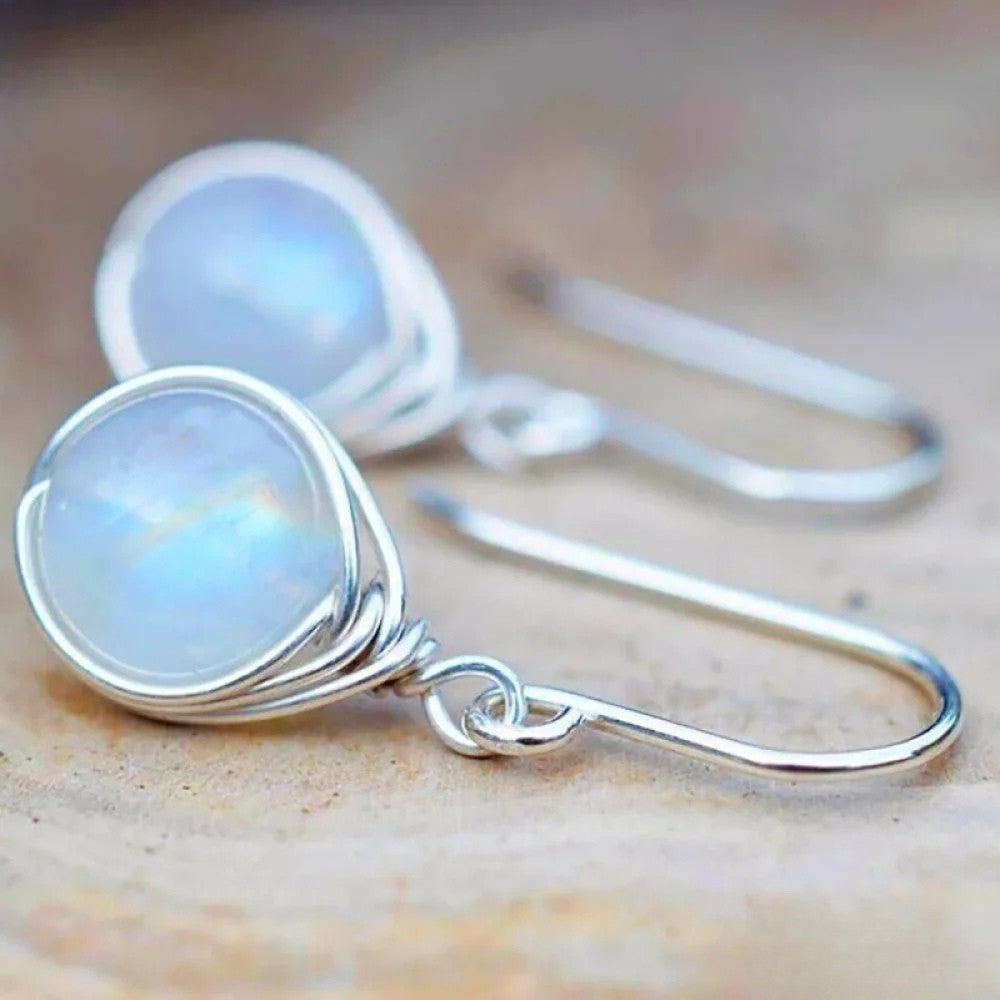 Retro™ Moonstone Earrings by Emma & Rose Cape Town featuring polished moonstone stones and elegant earring design.