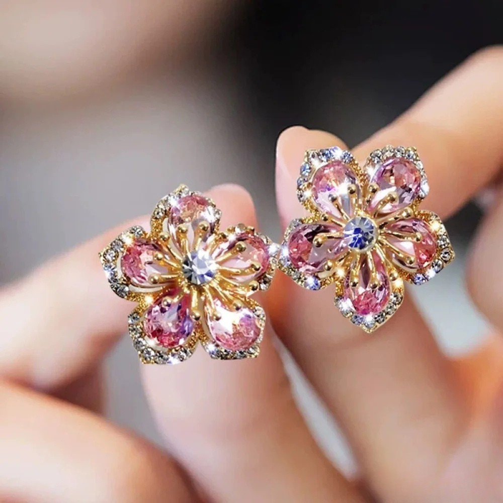 Sterling™ silver earrings by Emma & Rose Cape Town featuring colorful zirconia stones and intricate design.