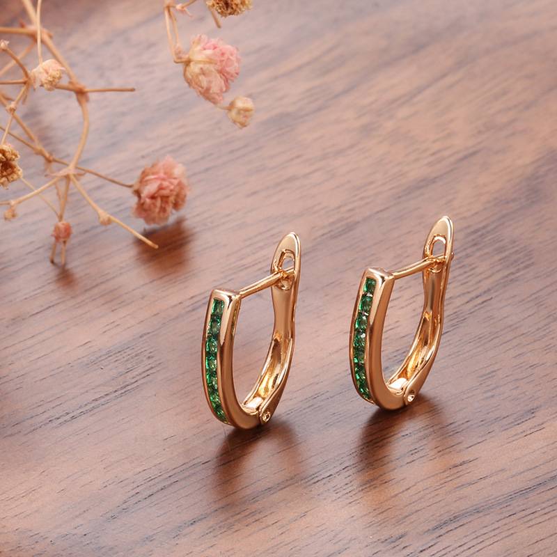 Suné™ Elegant Green Earrings by Emma & Rose Cape Town, showcasing stylish green earrings with intricate design details.