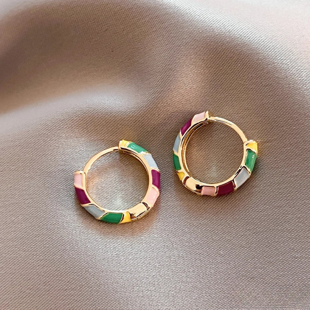 Emma & Rose Cape Town Yael gold earrings with elegant enamel design, showcasing intricate craftsmanship and stylish jewelry.