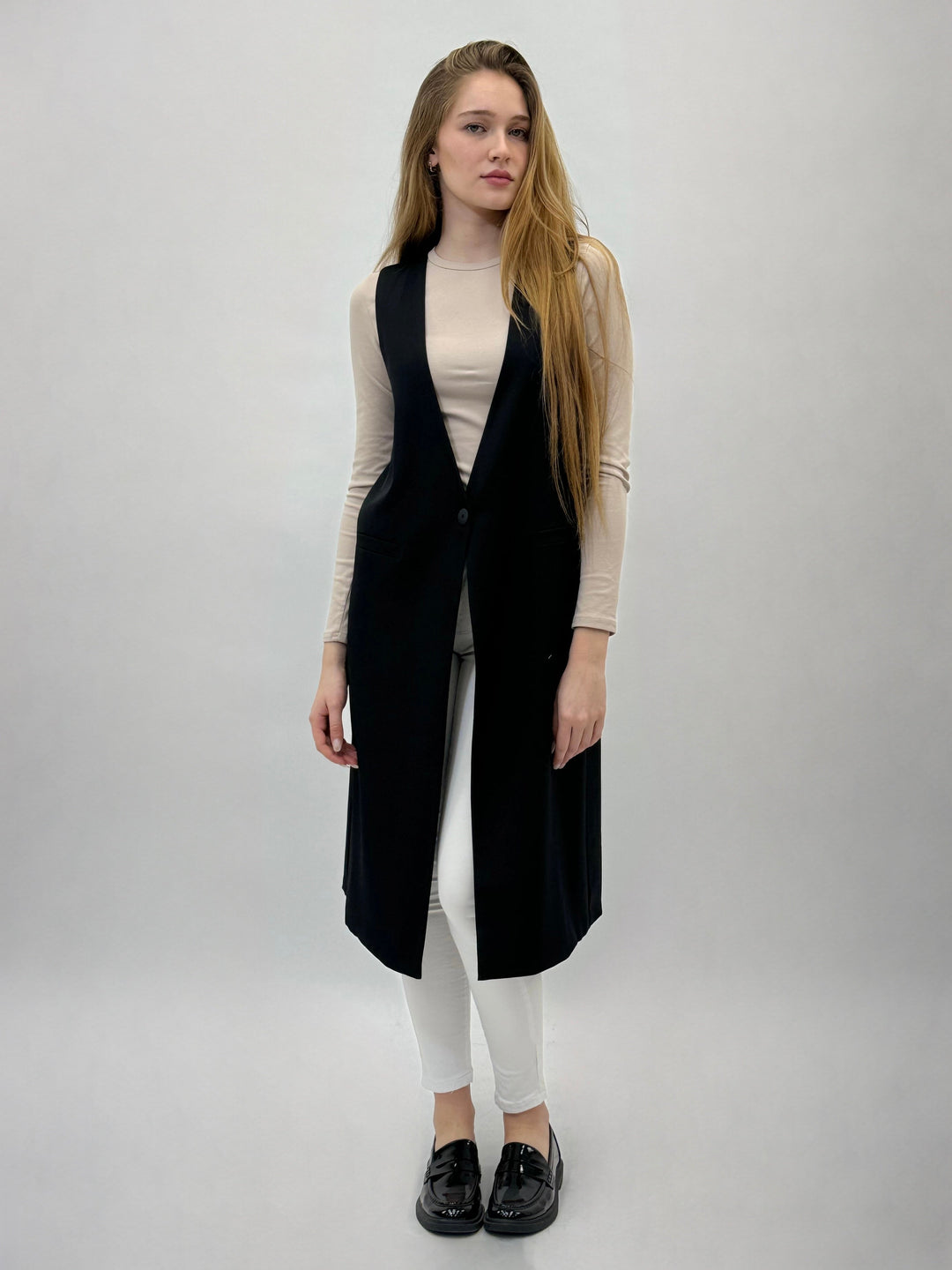 Black Quinn long waistcoat by Emma & Rose Cape Town featuring button closure, tailored fit, and stylish design.