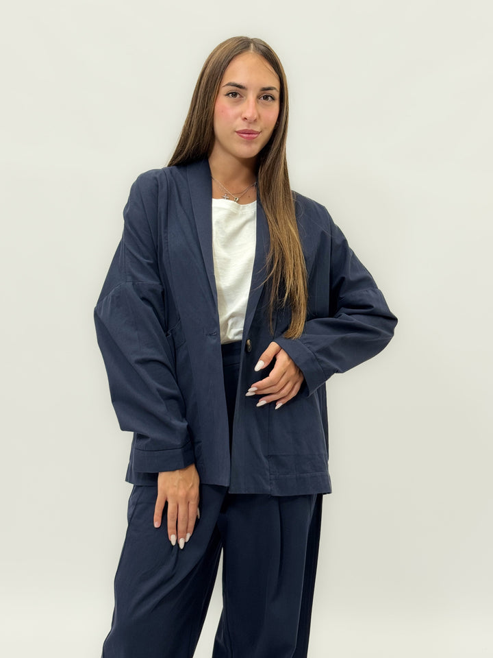 Beige Yael Emma & Rose Cape Town jacket with soft luxurious fabrics and button closure, stylish and comfortable for everyday wear.