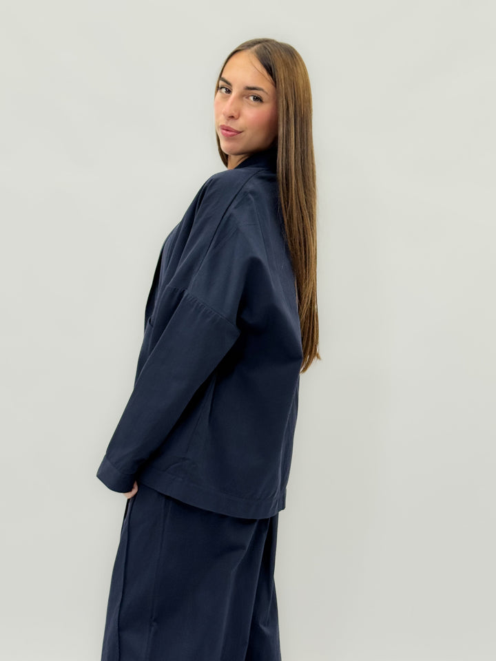Beige Yael™ jacket by Emma & Rose Cape Town featuring soft luxurious fabrics and button closure.