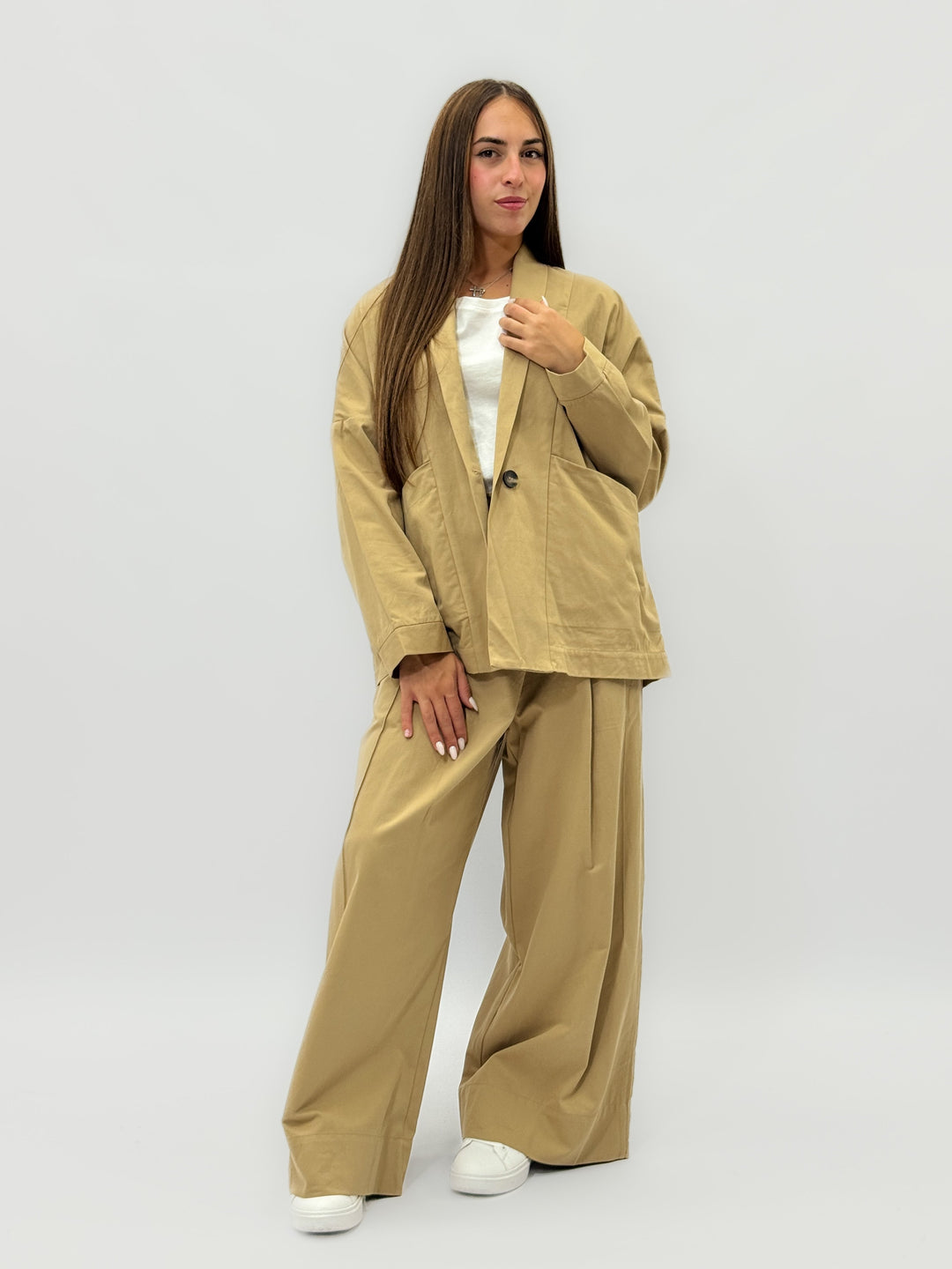 Beige Yael™ jacket by Emma & Rose Cape Town featuring soft luxurious fabrics and button closure.