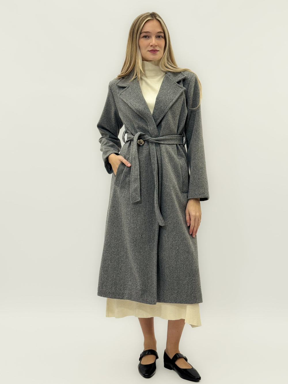 Black Fleur Emma & Rose Cape Town long coat with belt, showcasing warm, stylish outerwear with a sleek design.