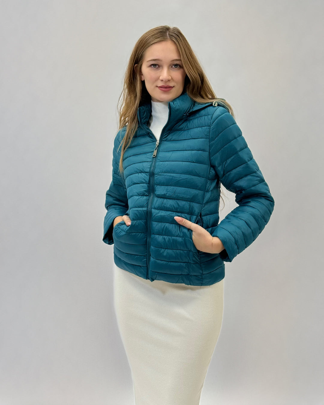 Black Ingrid™ padded jacket with hood and pouch from Emma & Rose Cape Town, showing front view and cozy design.