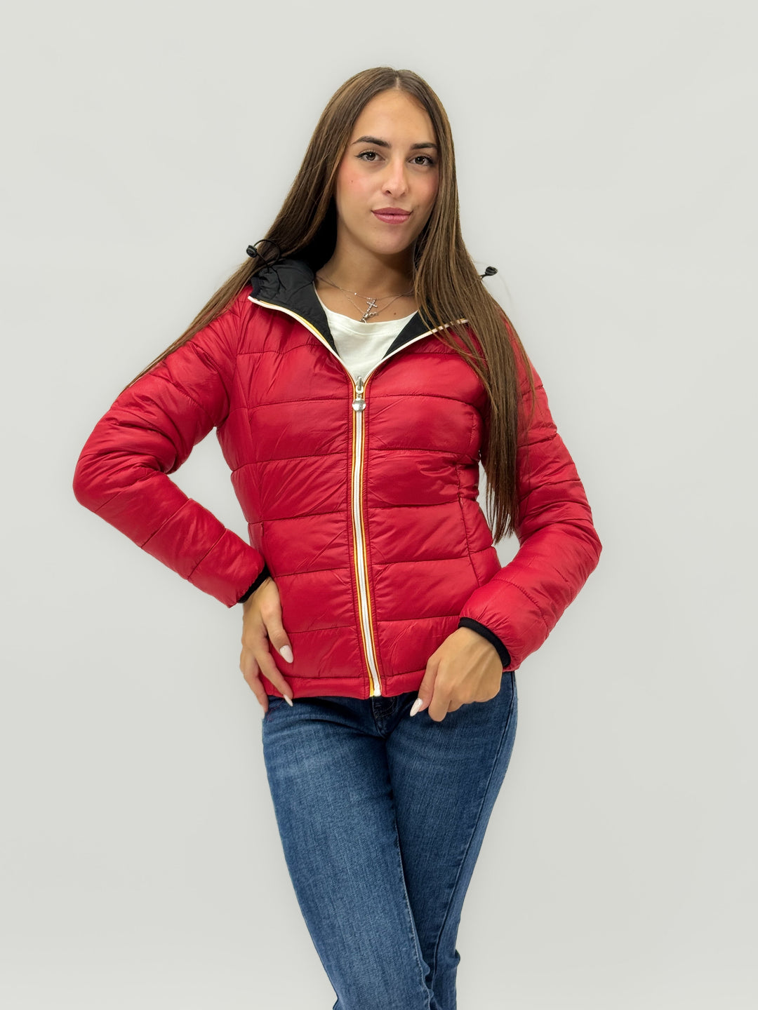 Reversible Emma & Rose Cape Town padded jacket hood in blue and fuchsia, featuring a warm, padded design with a hood for outdoor wear.