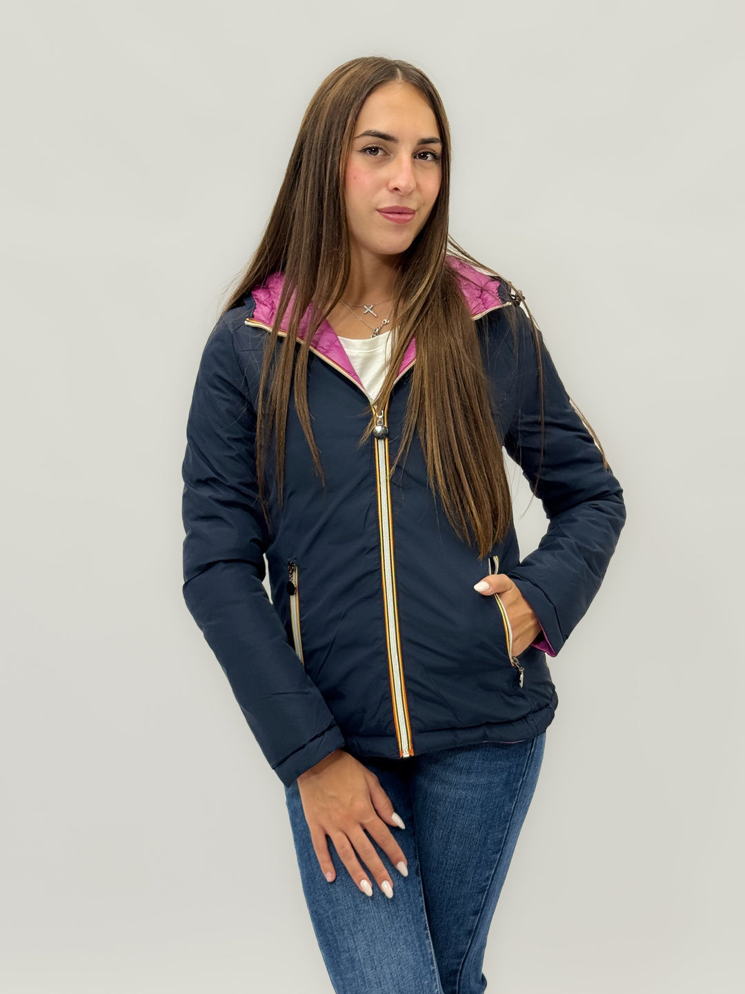 Reversible Emma & Rose Cape Town padded jacket with hood in blue and fuchsia, showcasing its stylish, dual-color design.