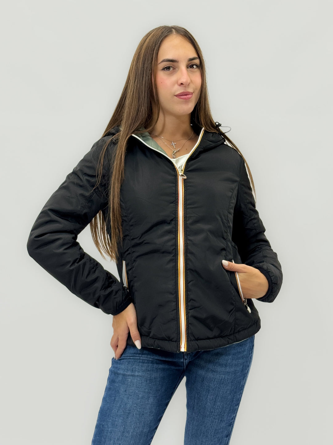 Reversible Emma & Rose Cape Town padded jacket with hood in blue and fuchsia, showcasing its vibrant, reversible design.