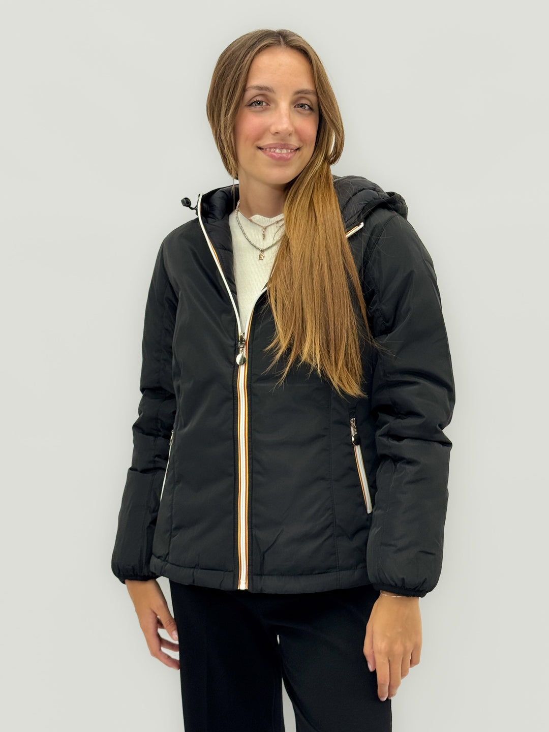 Reversible Emma & Rose Cape Town padded jacket with hood in blue and fuchsia, showcasing its stylish, reversible design.