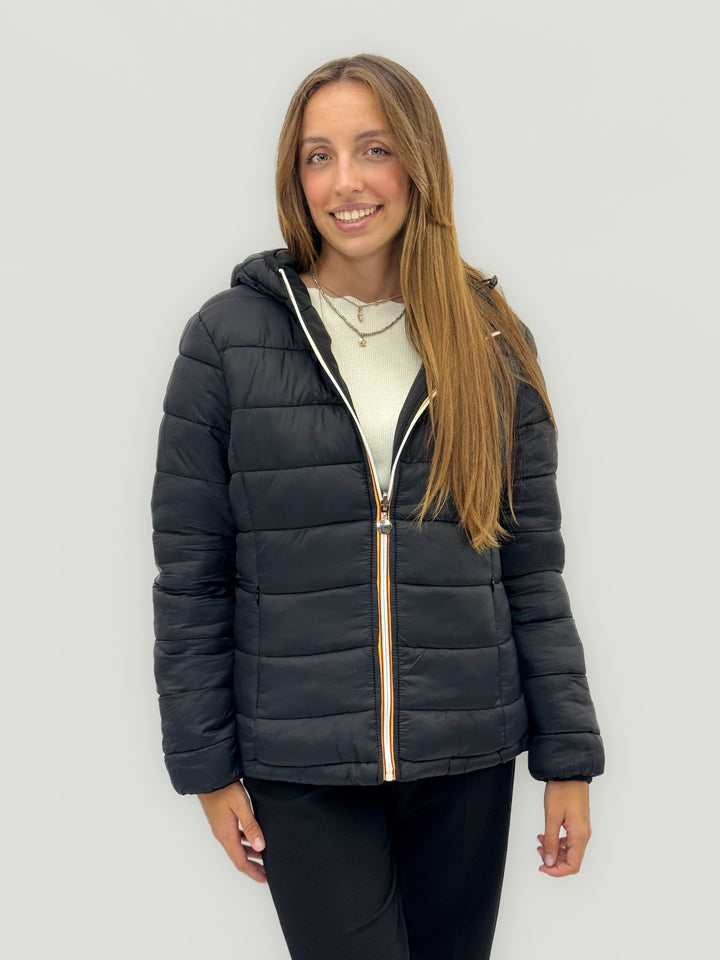 Reversible Emma & Rose Cape Town padded jacket hood in blue and fuchsia, showcasing its soft, insulated design for cold weather.