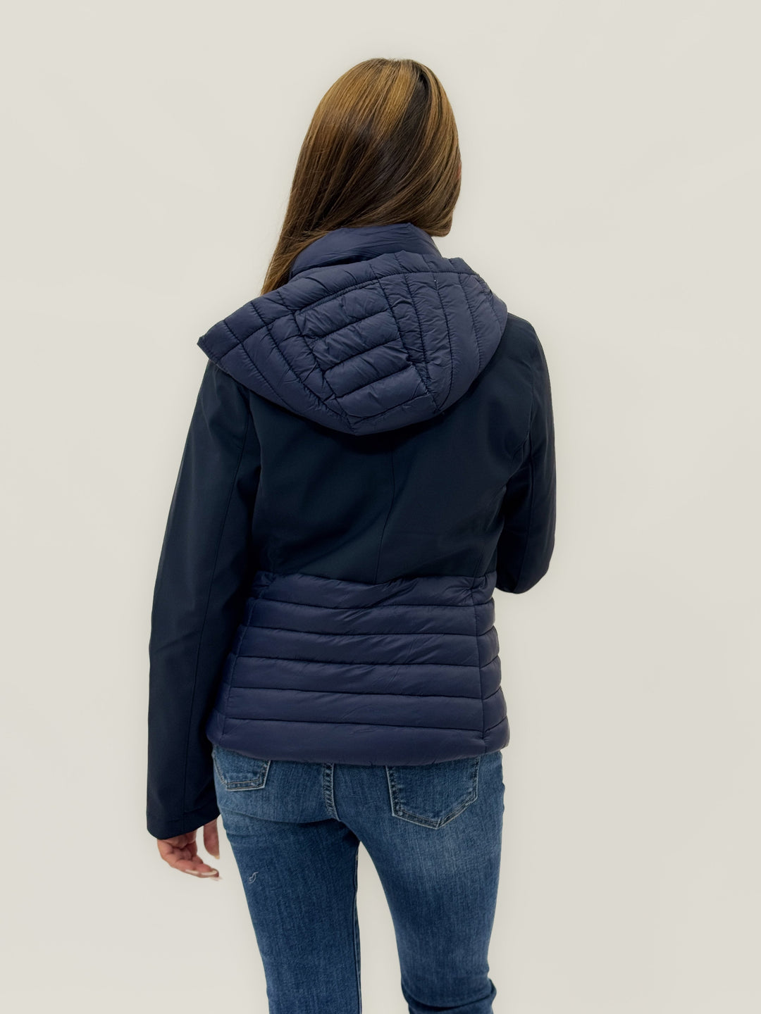 Blue Softshell™ Refined Puffer Jacket by Emma & Rose Cape Town, lightweight and warm, shown on a model.
