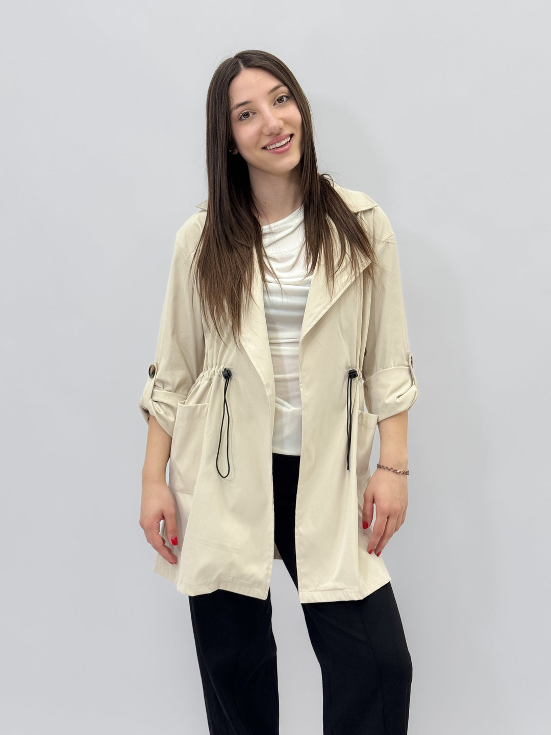 Cream Odette™ open trench coat by Emma & Rose Cape Town, stylish lightweight giacca with classic collar and belted waist.