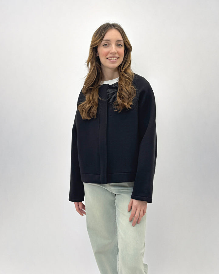 Light blue Neoprene™ jacket with floral design by Emma & Rose Cape Town, featuring a stylish, fitted cut and soft fabric.