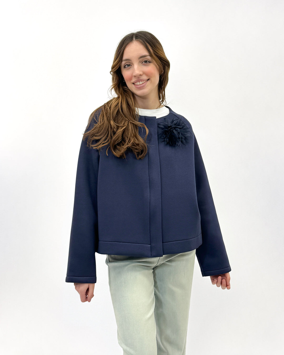 Light blue Neoprene™ jacket with floral design by Emma & Rose Cape Town, featuring a stylish and modern giacca silhouette.