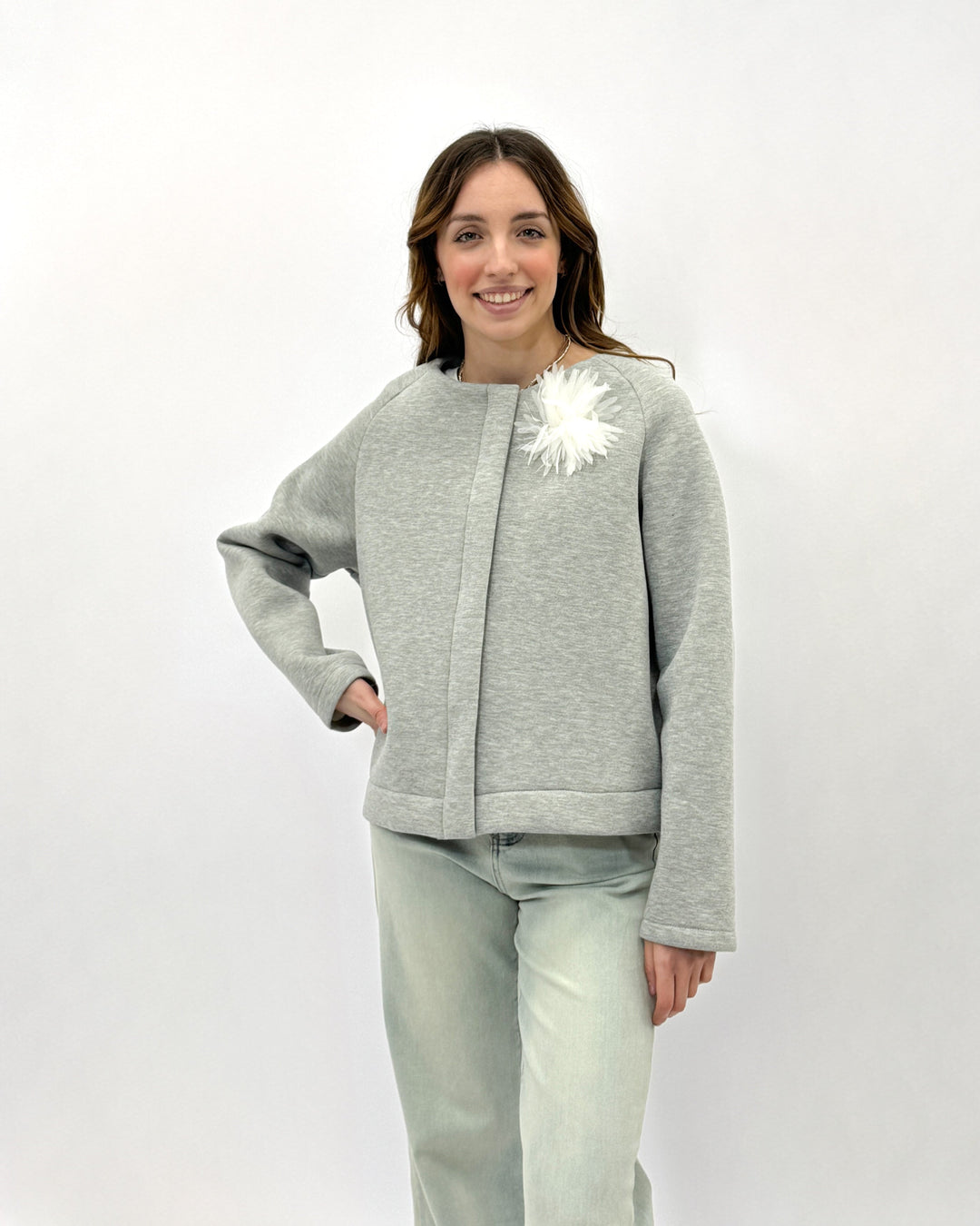 Light blue Neoprene™ jacket with floral design from Emma & Rose Cape Town, stylish and lightweight for casual wear.