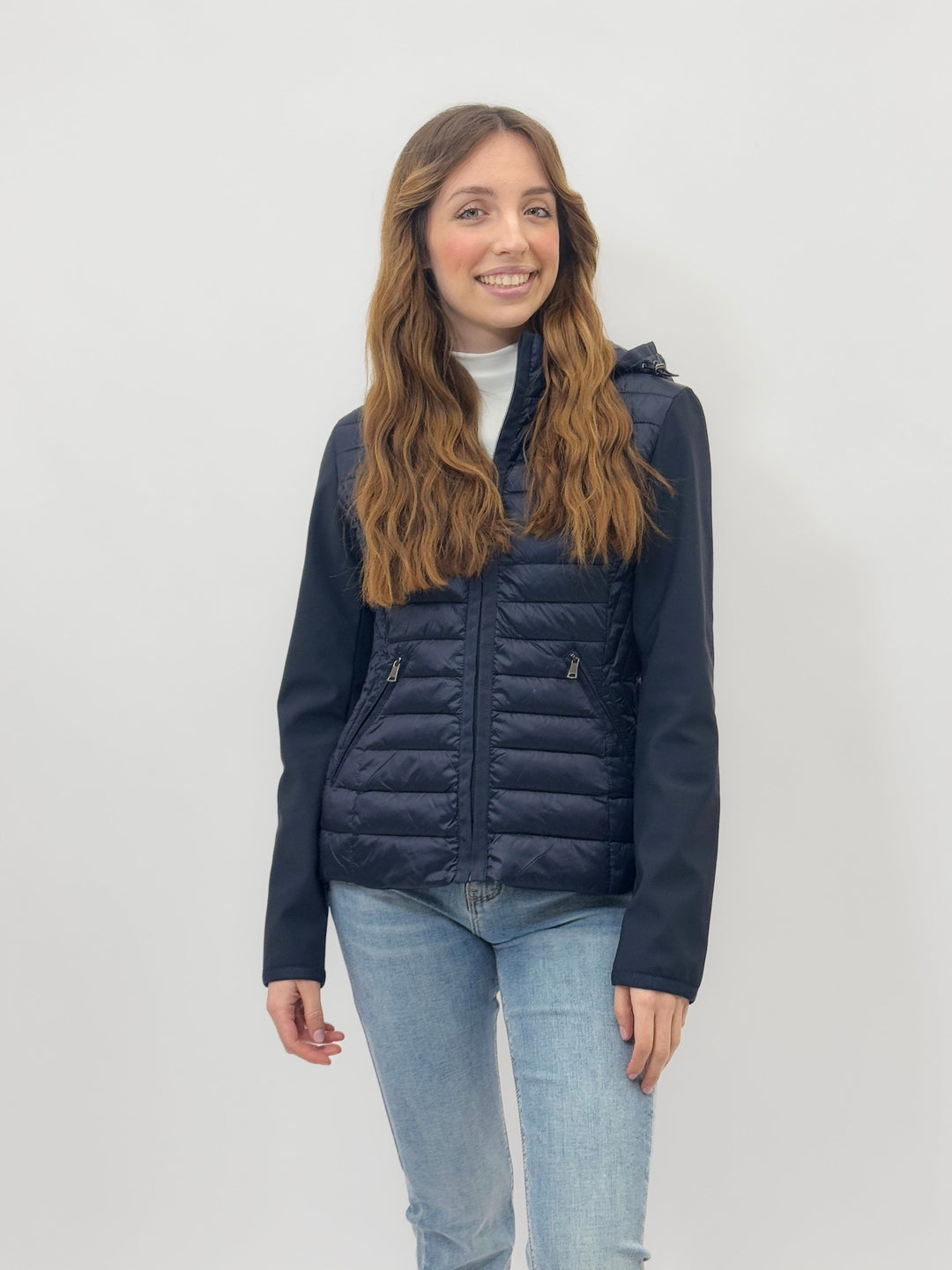 Light blue Lara™ ultra-lightweight puffer jacket by Emma & Rose Cape Town, shown with detailed close-up of quilted design.