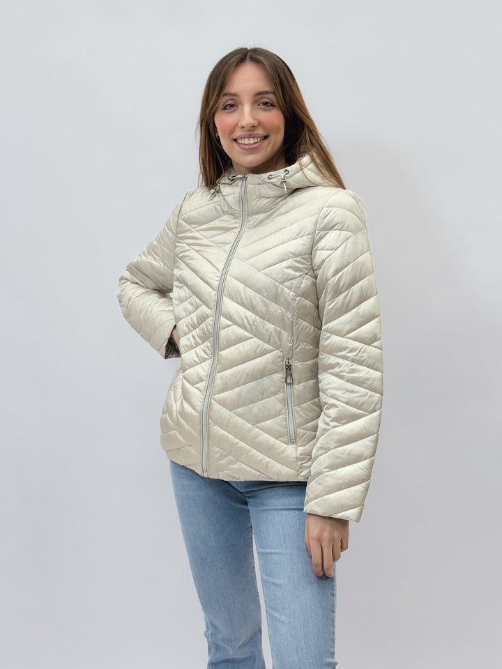 Lilac Karina™ hooded puffer jacket by Emma & Rose Cape Town, showcasing its cozy quilted design and attached hood.