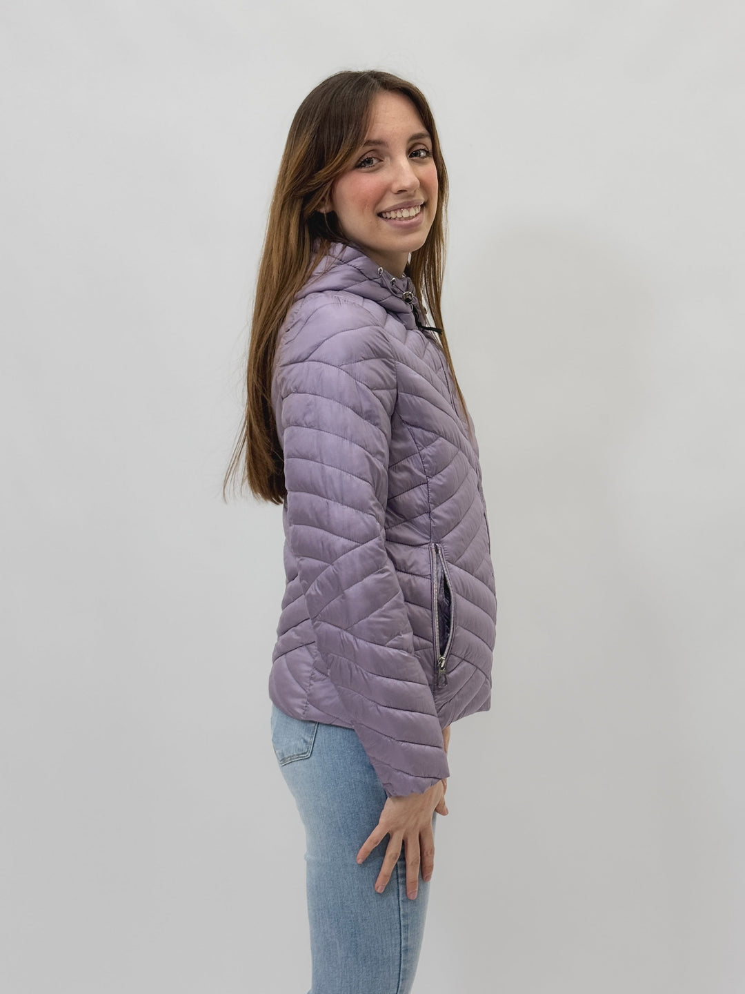 Lilac Karina™ hooded puffer jacket by Emma & Rose Cape Town, showing the quilted design and cozy hood on a stylish winter coat.