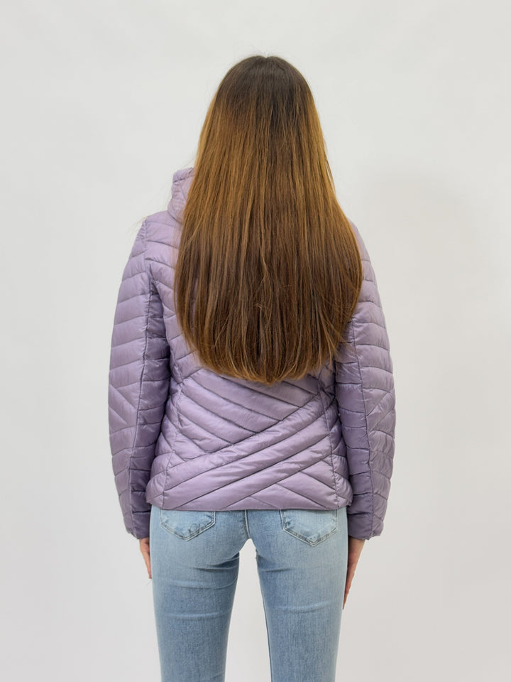 Lilac Karina™ hooded puffer jacket by Emma & Rose Cape Town, featuring a cozy quilted design and attached hood.